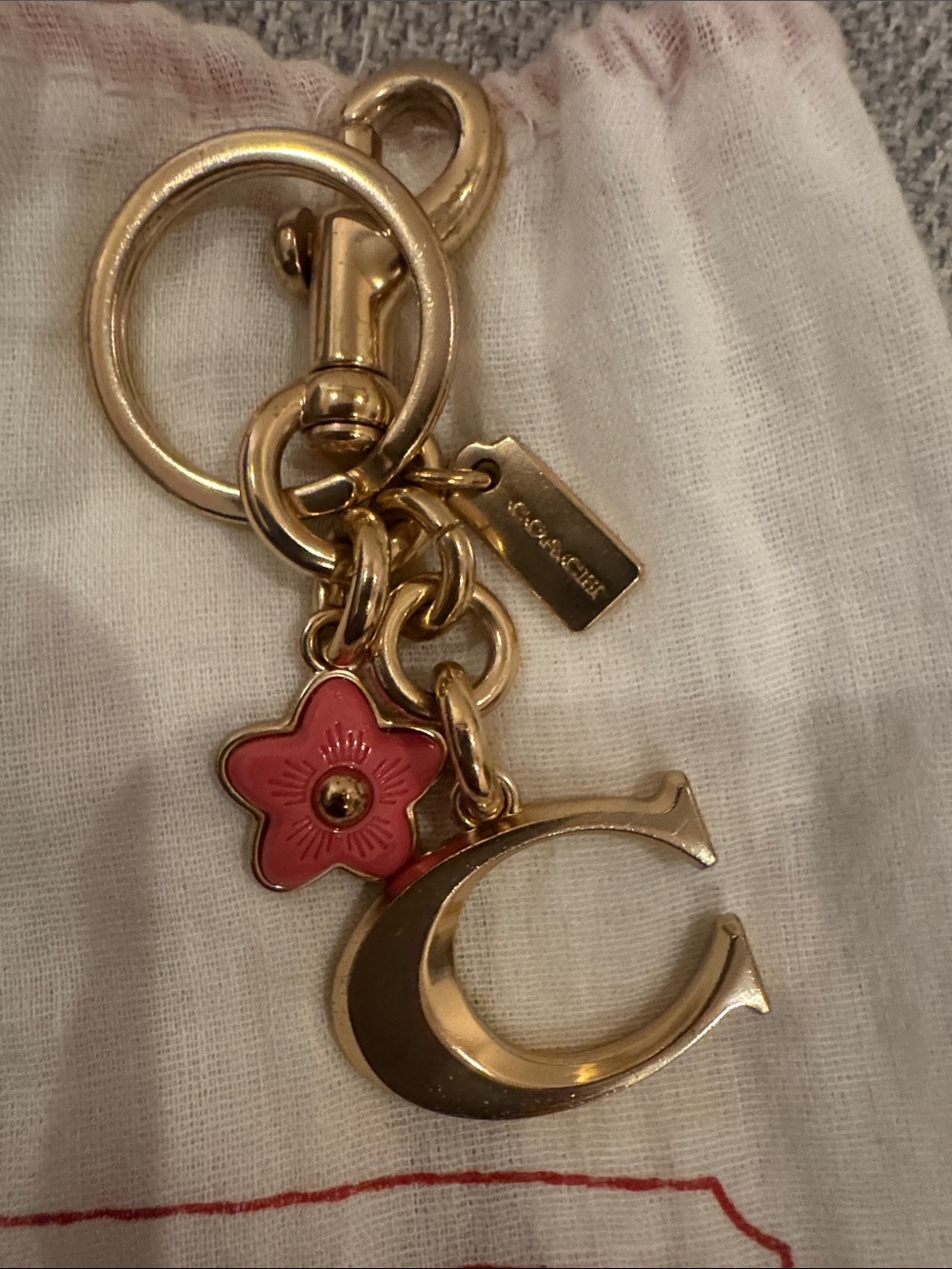 NWOT, Coach vintage gold “C” key fob/ bag charm in gold . - Picture 2 of 6